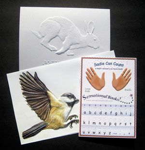 A selection of custom embossed cards and pictures